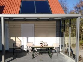 Overdekt terras Vakantievilla Eb en Vloed 7